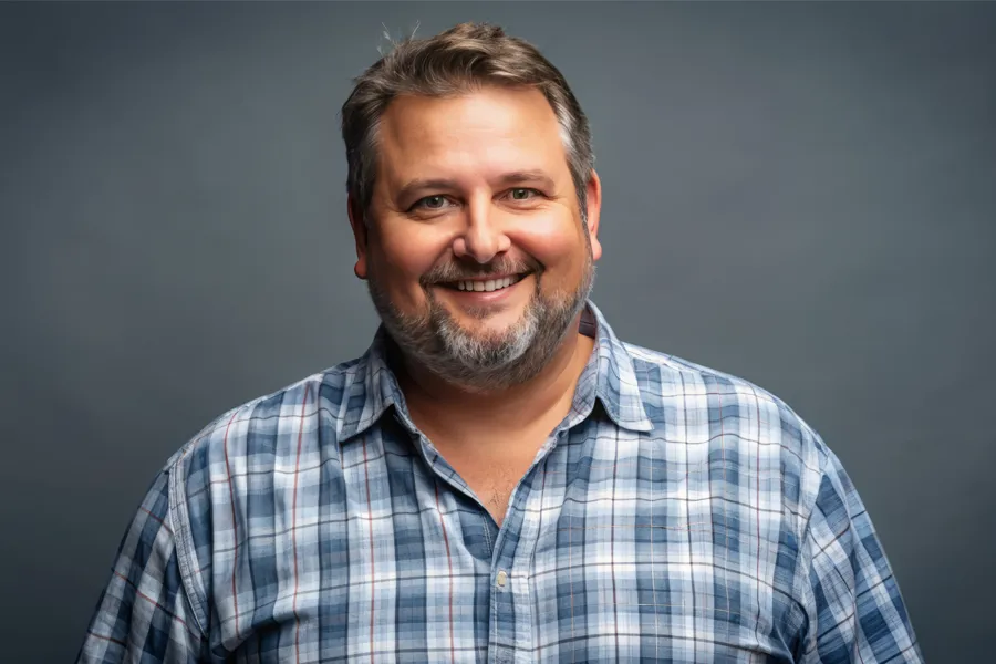 High-Cholesterol-Clinic A happy, slightly overweight man with a beard. Get treatment for high cholesterol from Dr. Donna Diamond in Louisville/Boulder.