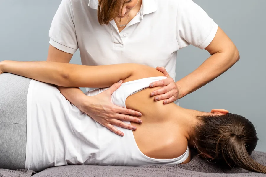 Osteopathy-Clinic A clinician gives a woman osteopathic treatment. Get osteopathy treatment from Dr. Donna Diamond in Louisville/Boulder.